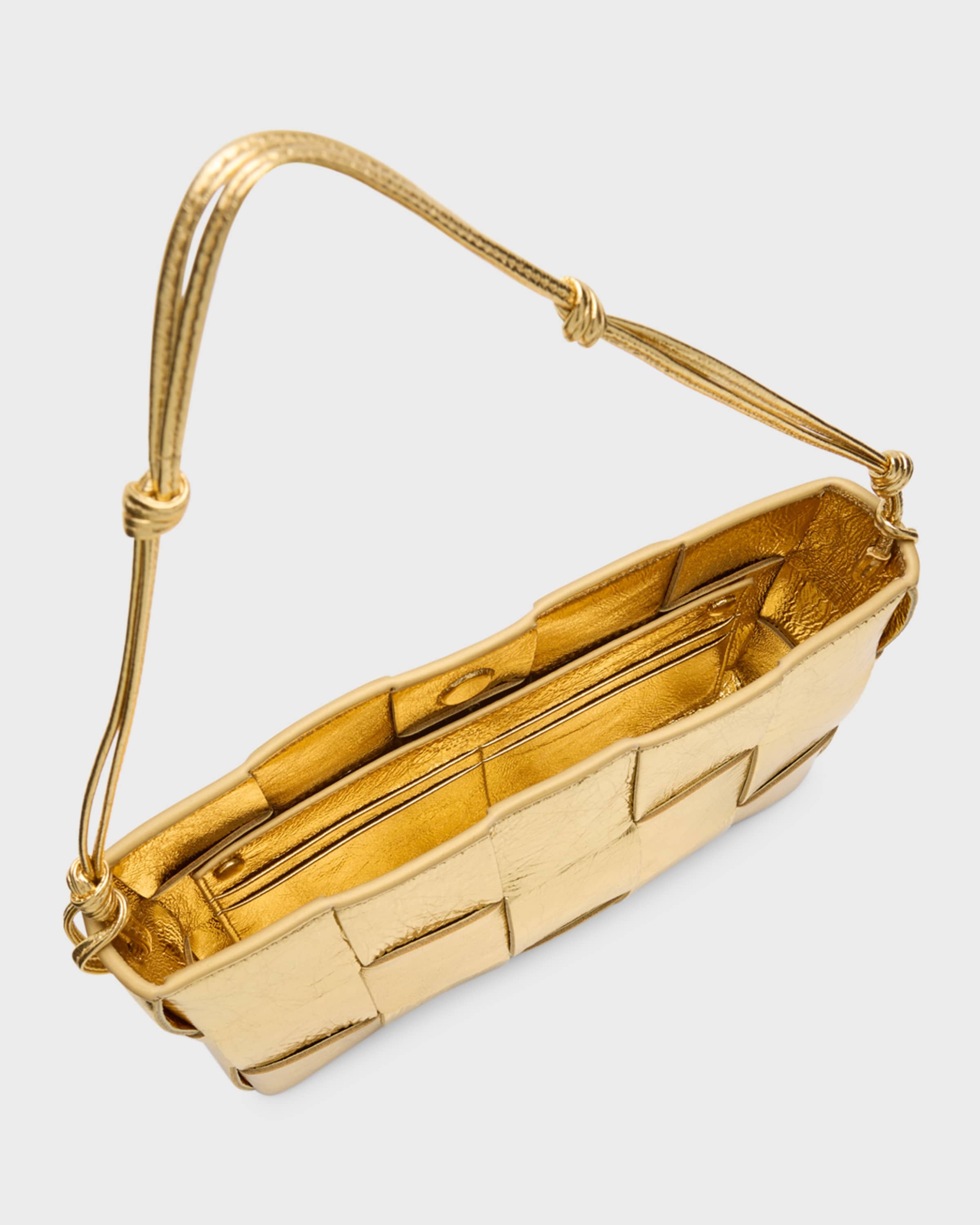 ショルダーバッグ・ポシェット BOTTEGA VENETA Baguette Pochette Shoulder Bag Bottega Veneta Baguette Pochette Bag in Travertine & Gold | FWRD