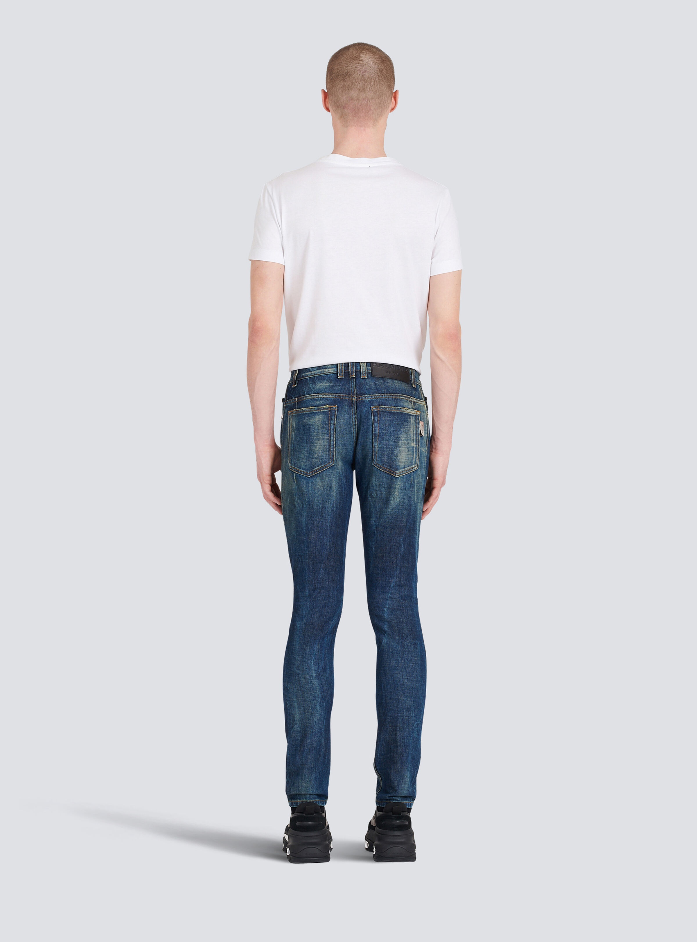 Slim cut faded cotton jeans - 4