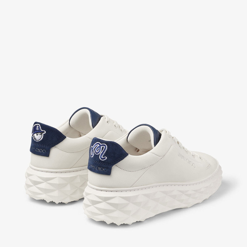 JIMMY CHOO Jimmy Choo / Malbon Diamond Golf/F
Latte and Navy Leather Trainers outlook