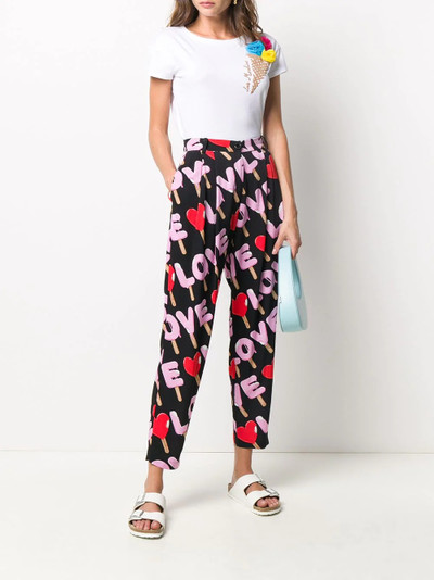 Moschino printed tailored trousers outlook