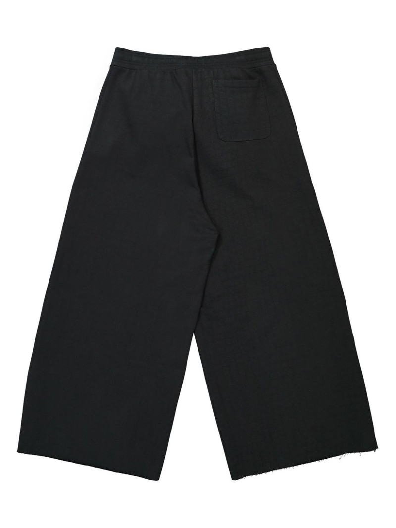 VETEMENTS Gothic Monogram track pants outlook