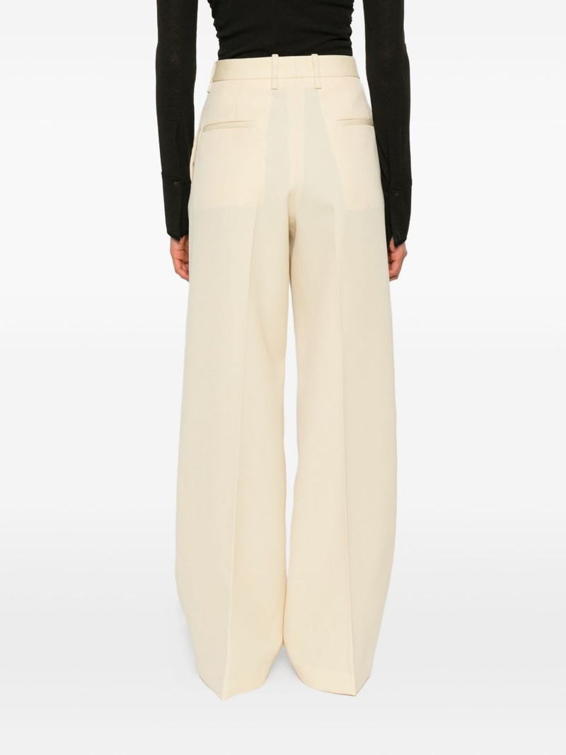 high-waisted wool trousers 4
