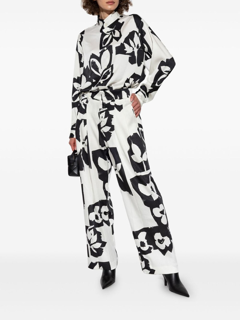ISSEY MIYAKE abstract-print trousers outlook