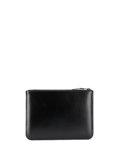 Comme Des Garçons embossed logo wallet outlook