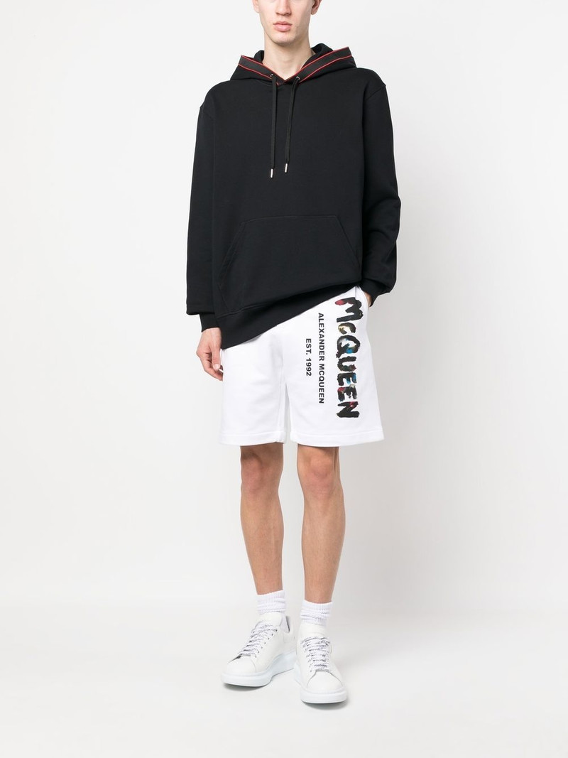 Alexander McQueen Graffiti-print cotton track shorts outlook