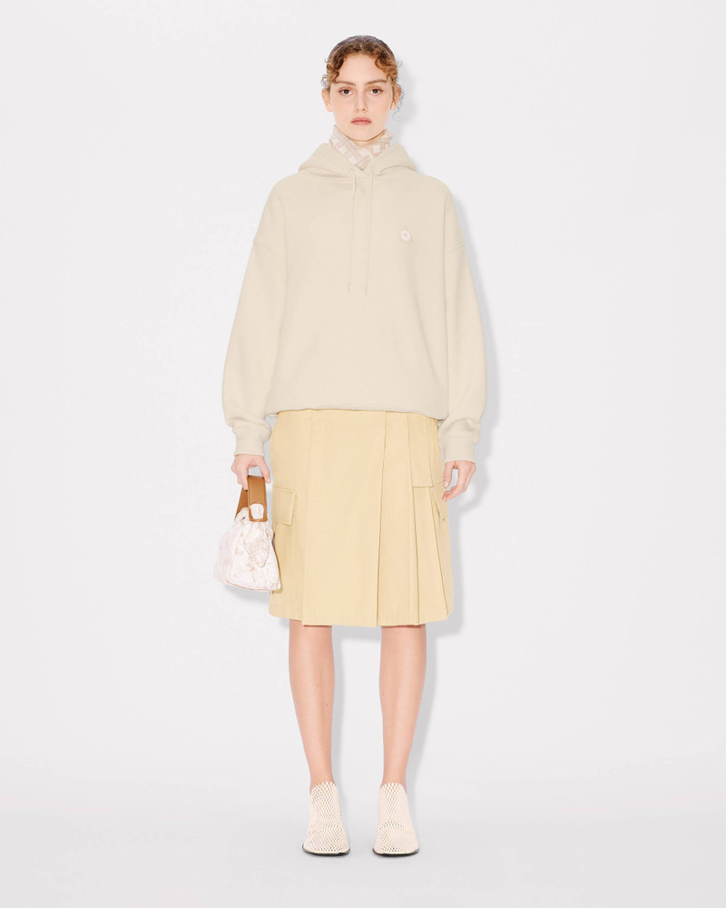 Asymetric skirt with cargo details in cotton 3