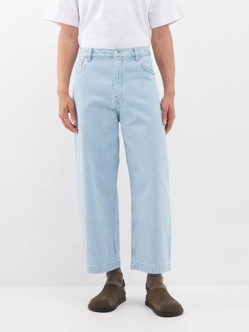 Studio Nicholson Paolo bleach-wash wide-leg jeans | matchesfashion