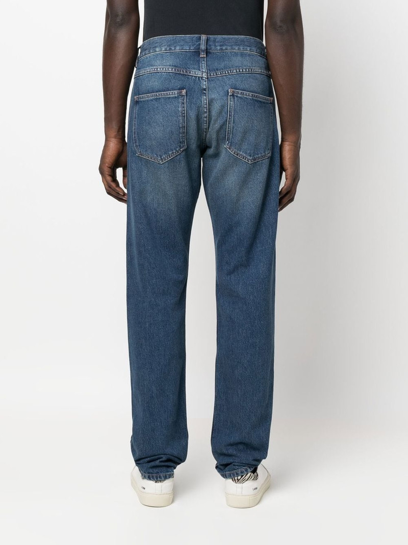 straight-leg mid-wash jeans 4