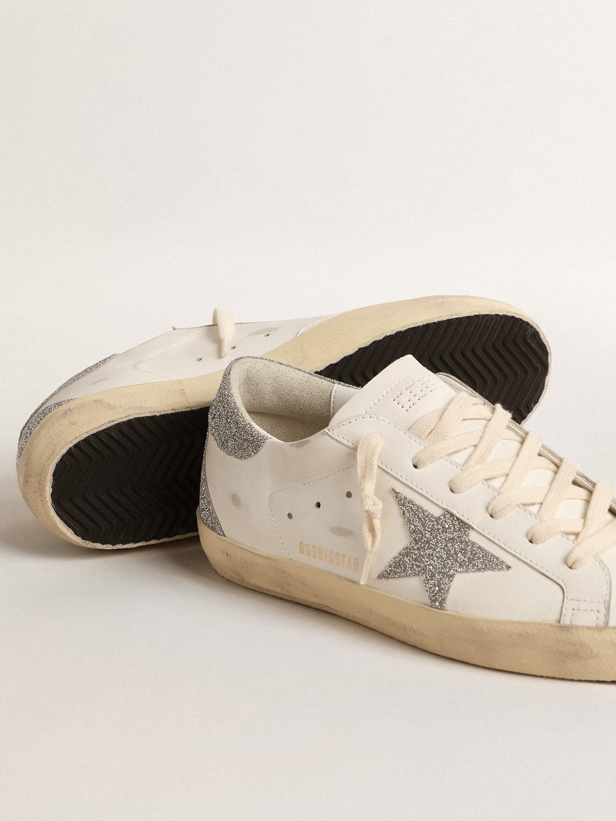 Men's Super-Star with black heel tab and metal stud lettering