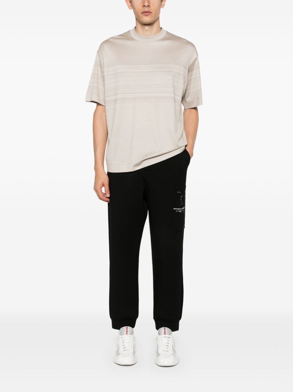 graphic-print tapered trousers - 2