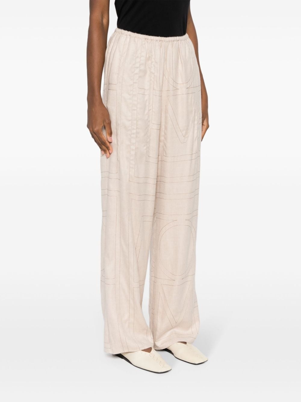 stich-embellished tapered trousers - 3