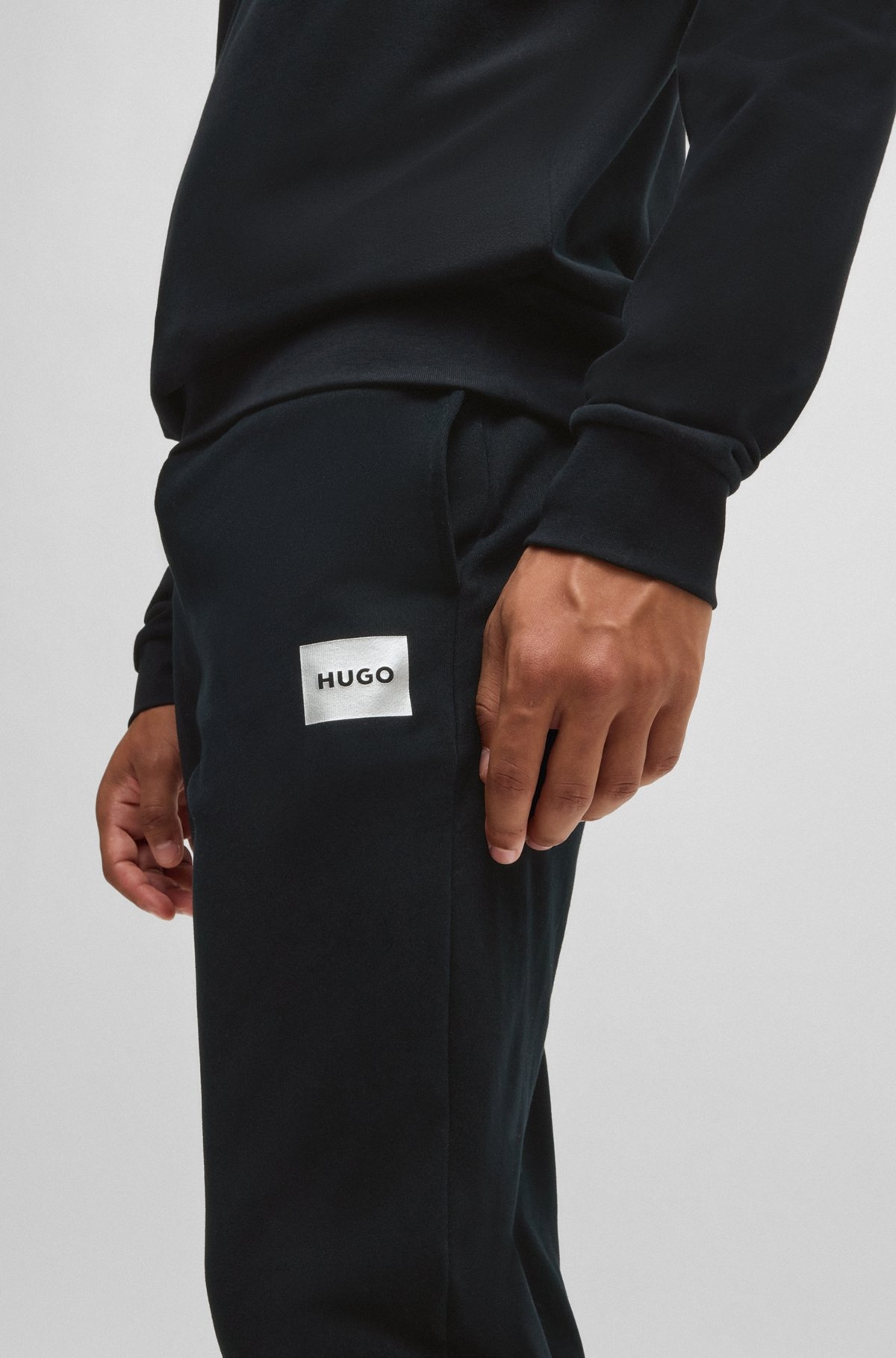 TRACKSUIT BOTTOMS WITH METALLIC LOGO LABEL - 5
