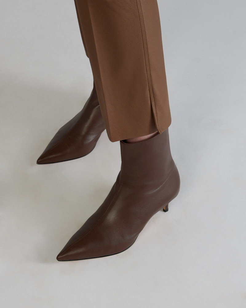 Slim fit trousers in stretch faux leather 4
