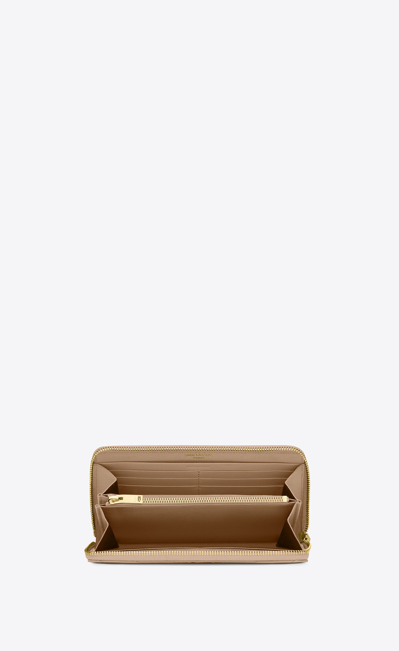cassandre saint laurent matelassé zip around wallet in grain de poudre embossed leather 4