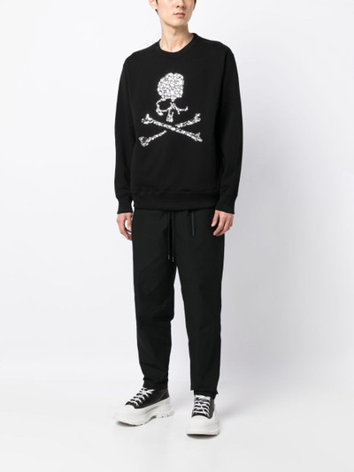 MASTERMIND WORLD logo-print tapered-leg trousers outlook