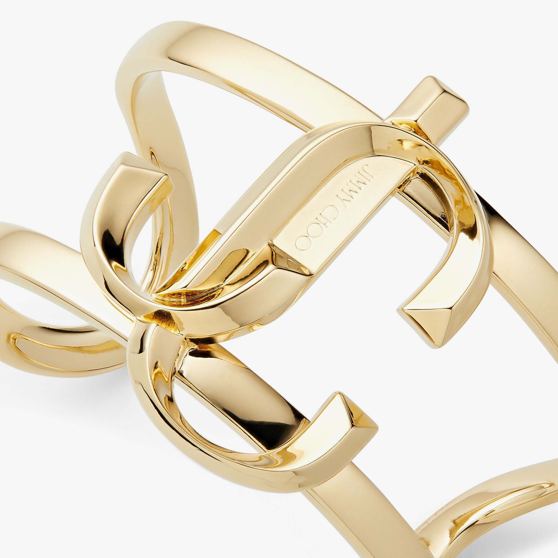 JC Monogram Cuff
Gold-Finish Metal JC Monogram Cuff Bracelet - 4