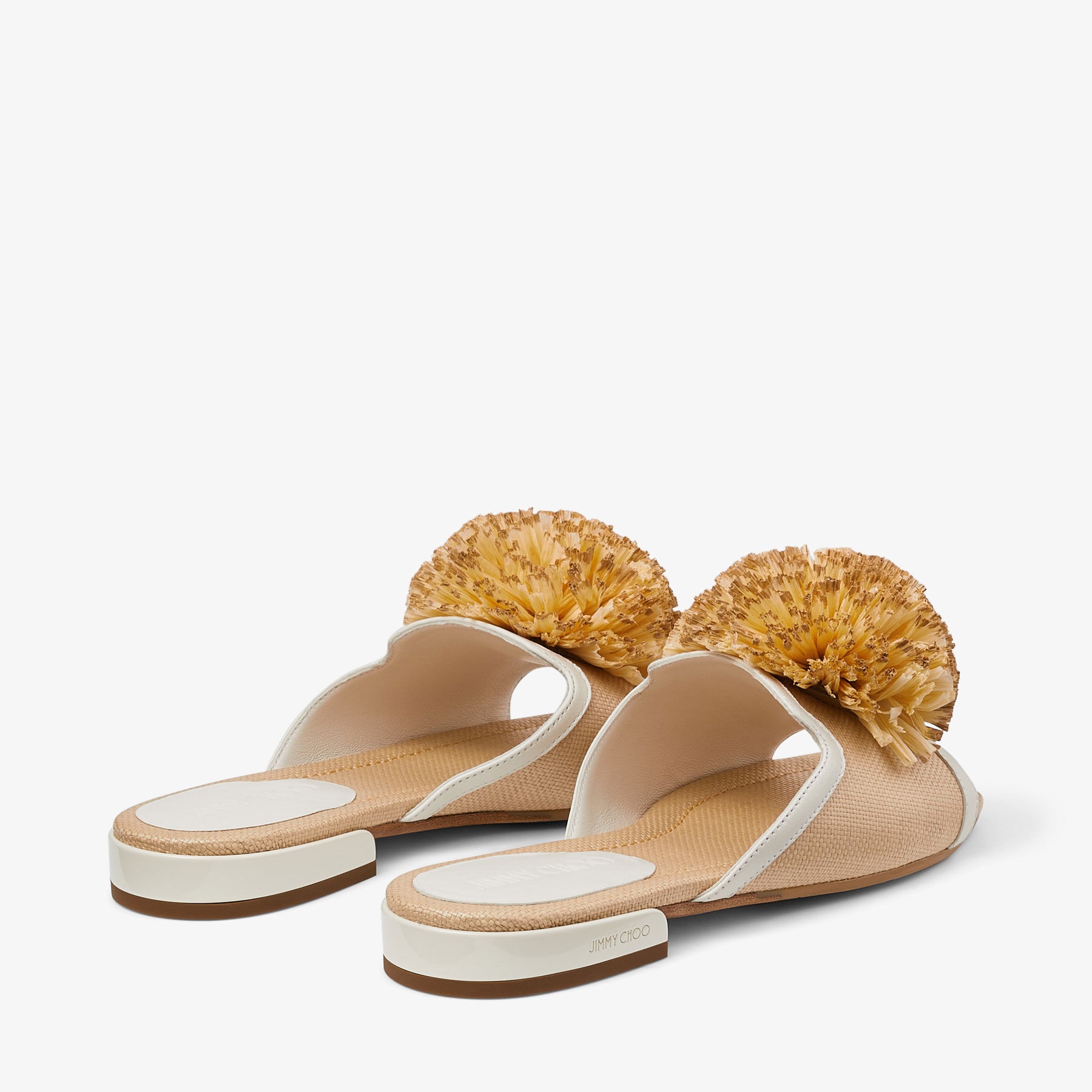 Nako Flat
Natural/Latte Raffia Pom Pom Flats - 5