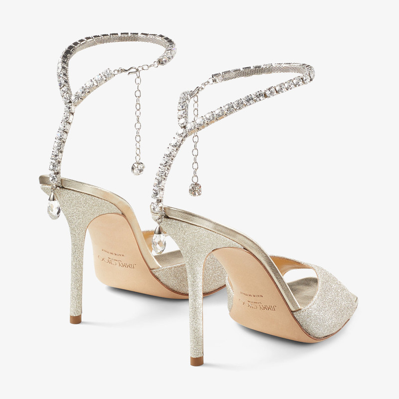JIMMY CHOO Saeda Sandal 100
Platinum Ice Dusty Glitter Sandals with Crystal Embellishment outlook