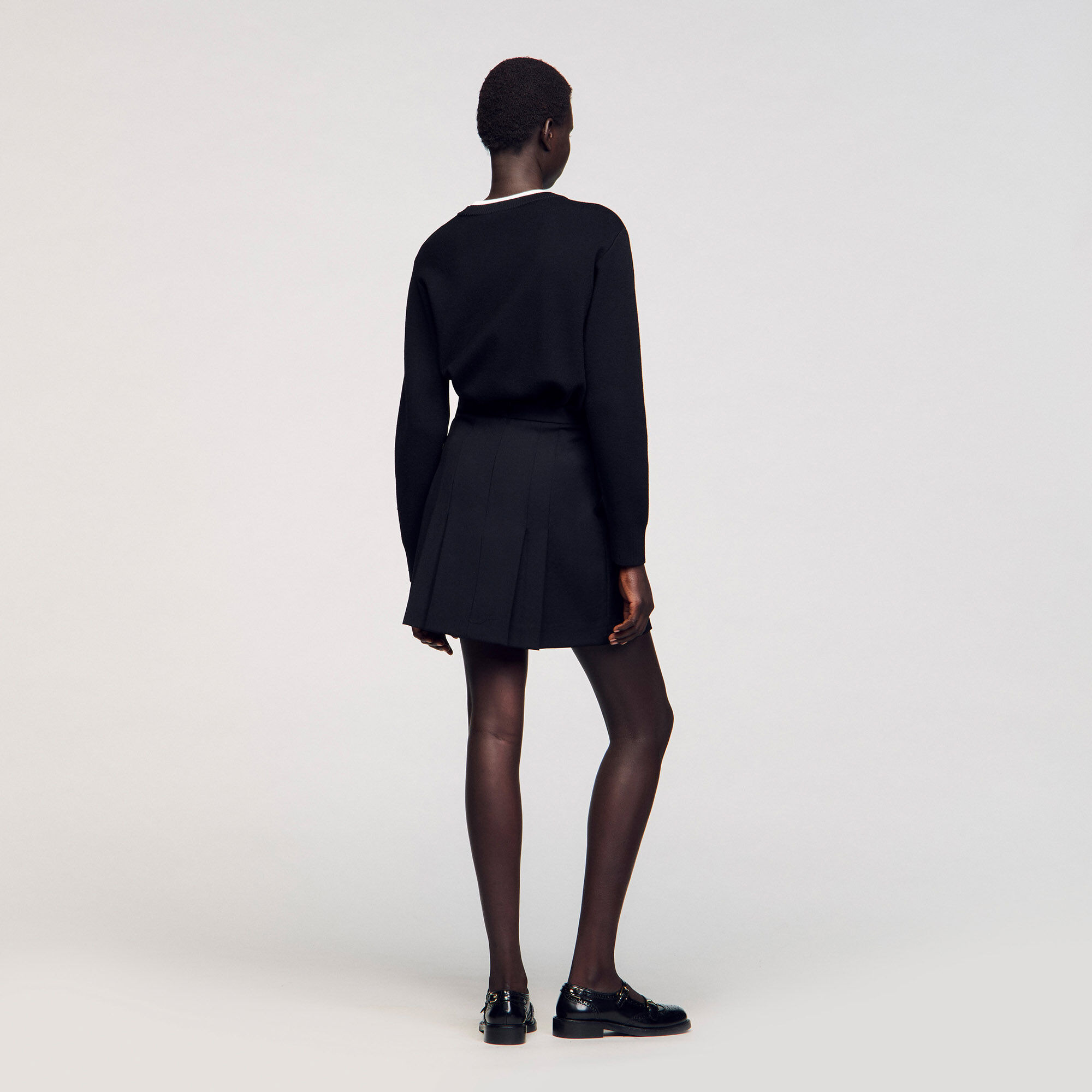 SHORT SKIRT WITH STITCHED PLEATS - 6