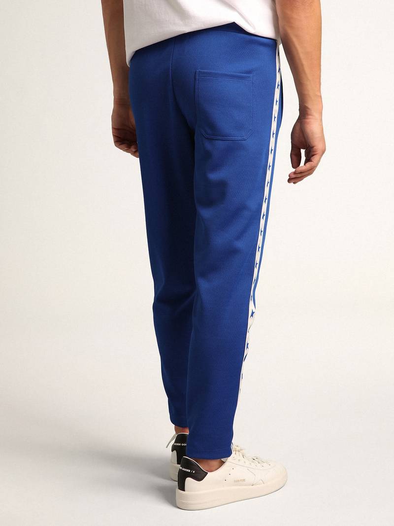 Men's blue joggers with band and stars on the sides 4