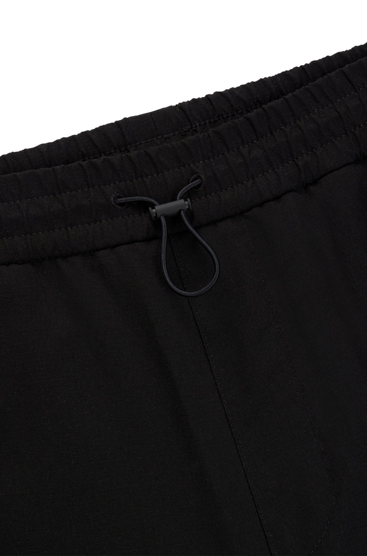 WATER-REPELLENT TROUSERS WITH ADJUSTABLE HEMS - 6
