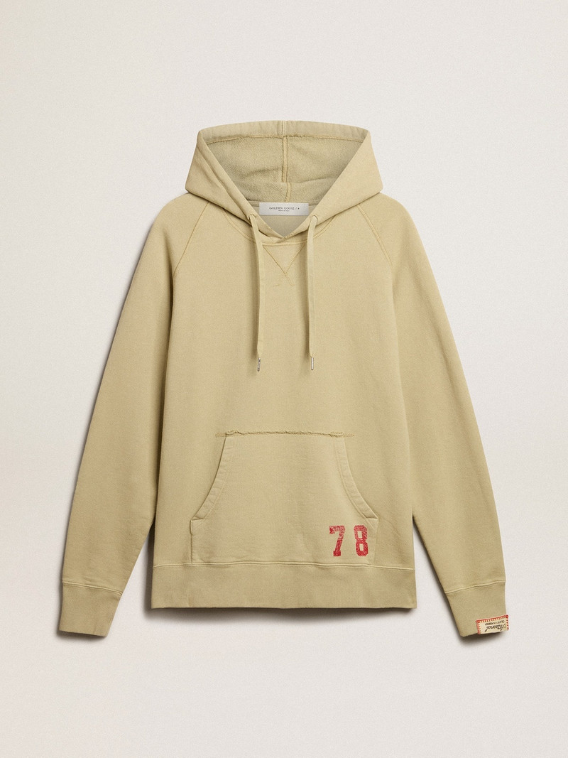 Pale eucalyptus-colored hoodie with front pocket 1