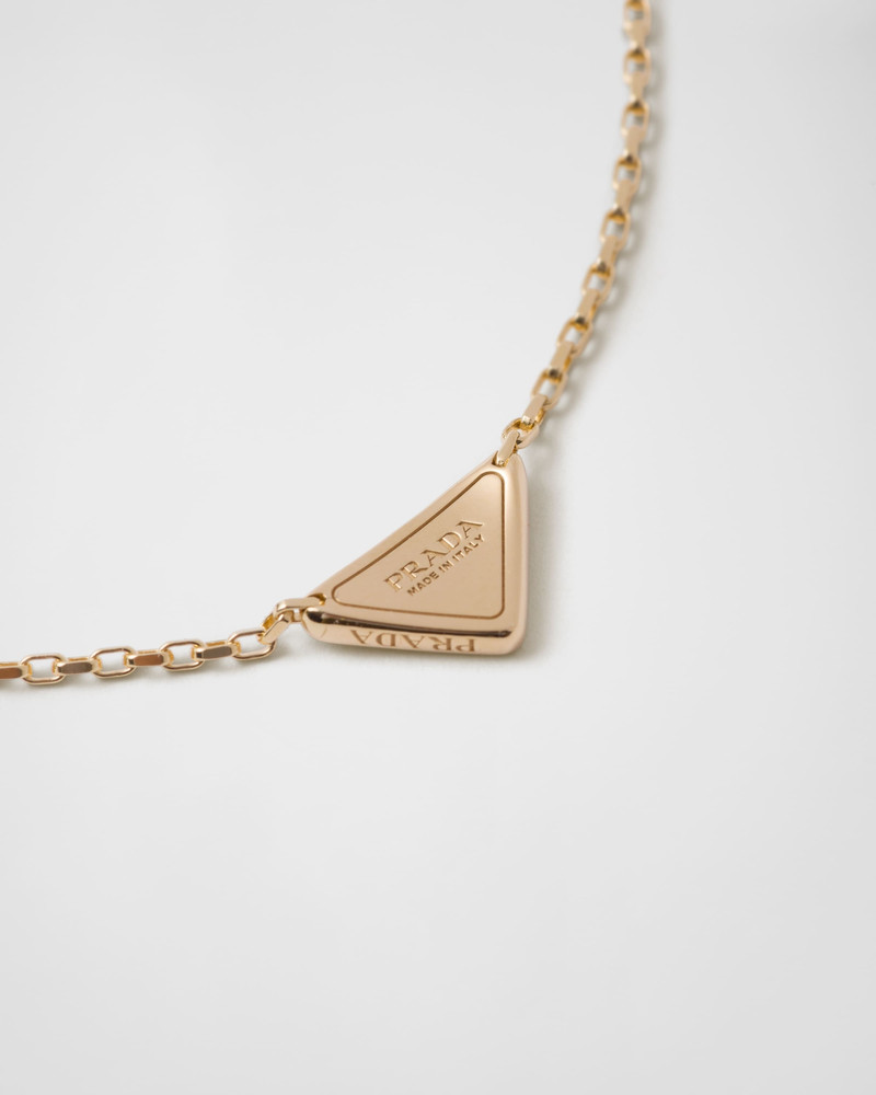 Prada Eternal Gold micro triangle pendant necklace in yellow gold and diamonds outlook