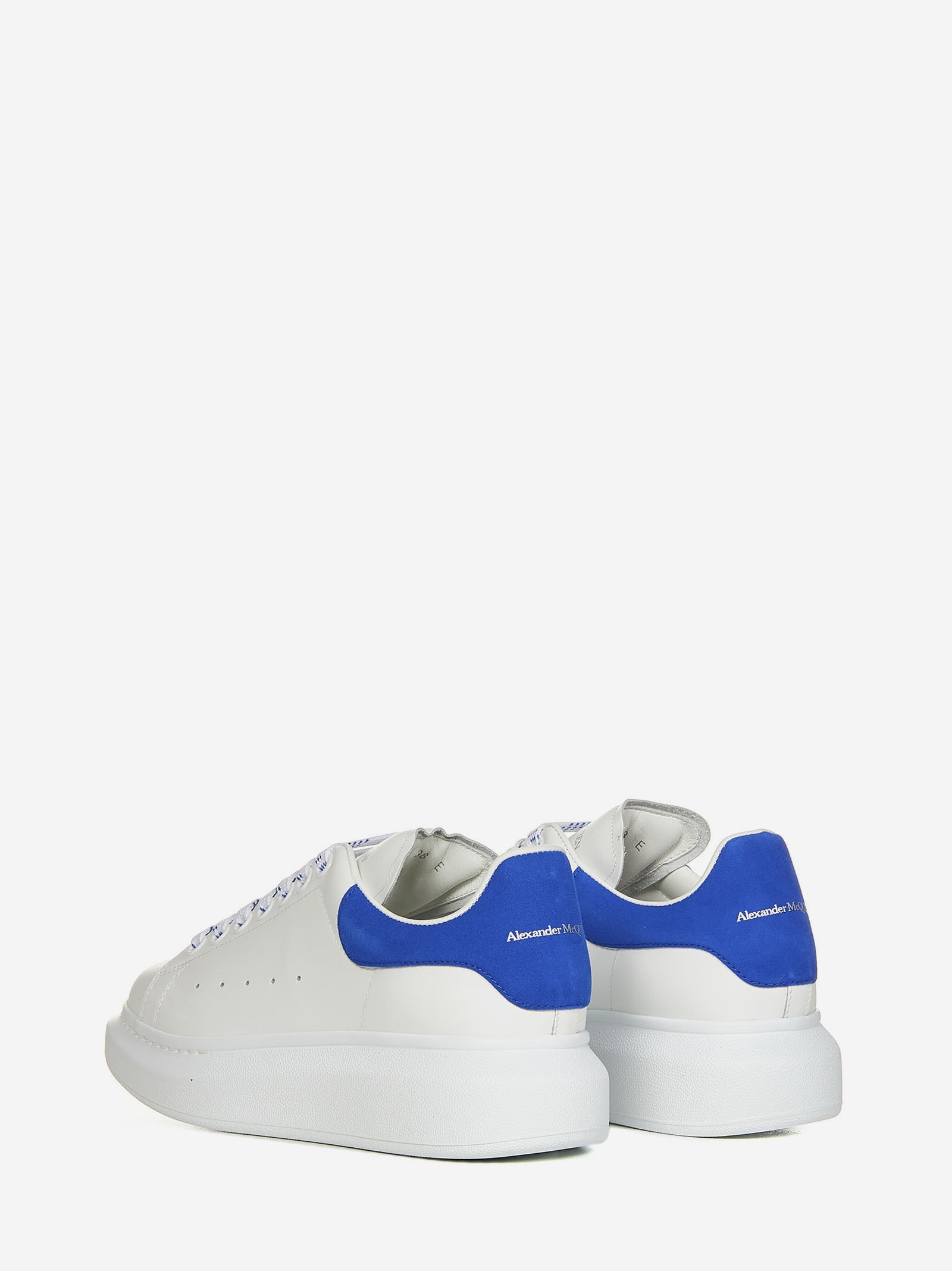 Oversize white smooth leather sneakers with electric blue suede detail on the heel. - 3