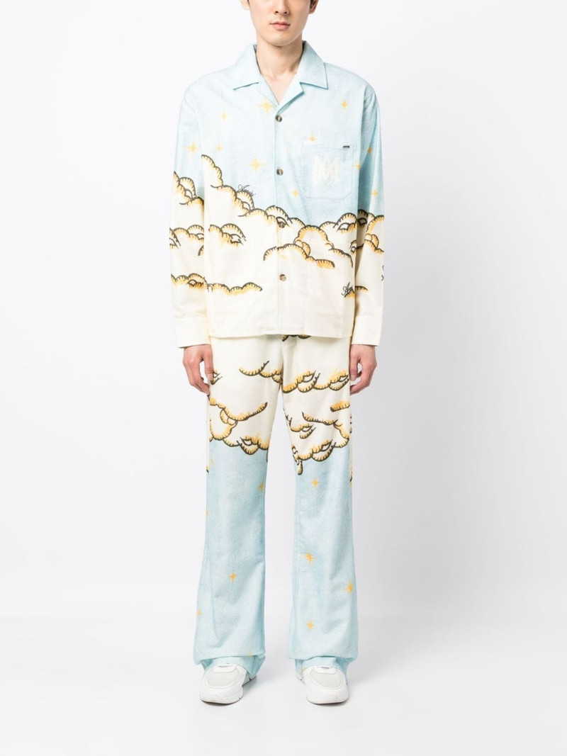 AMIRI Sunscape-print flared trousers outlook