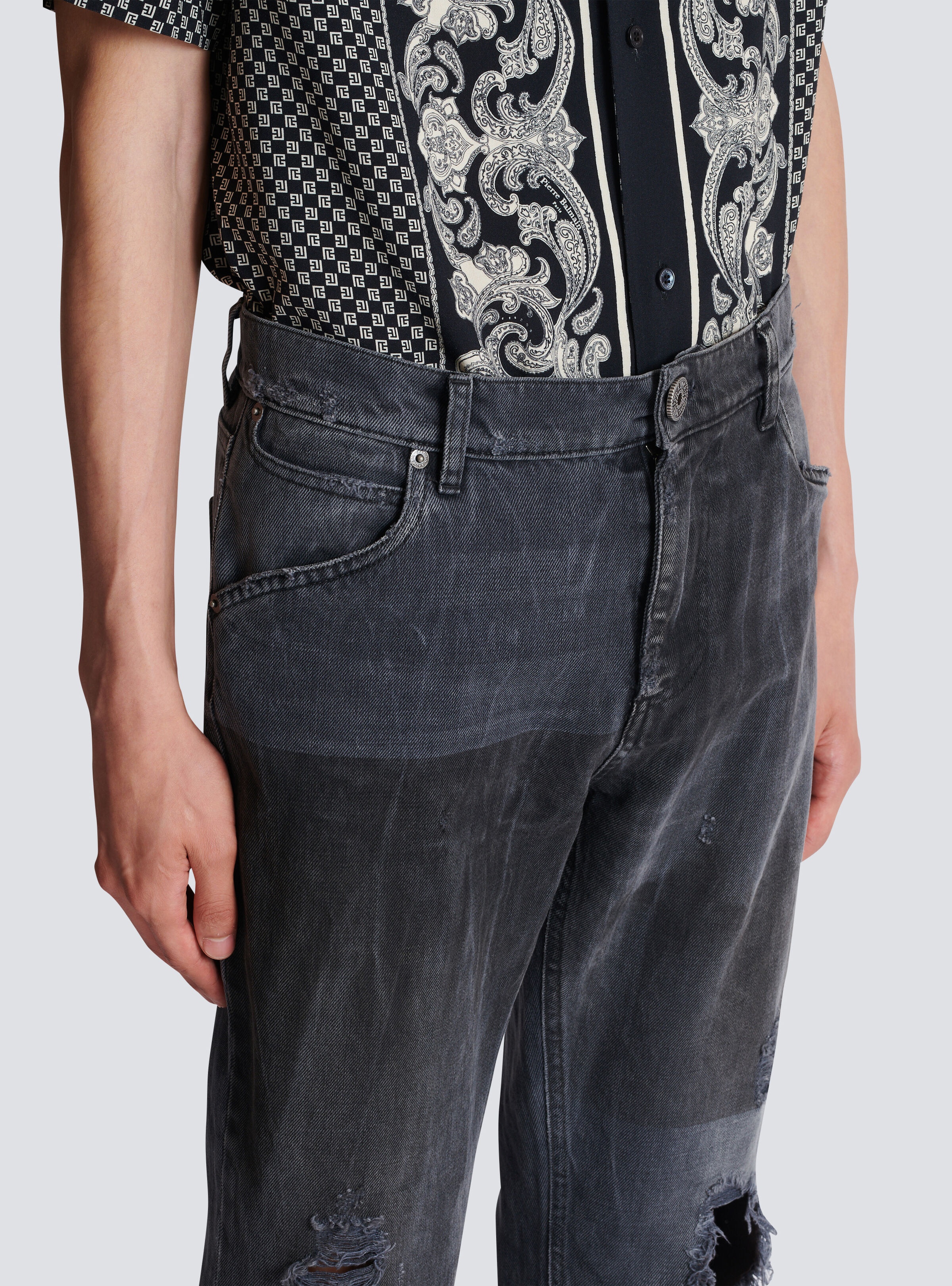 Faded denim patchwork jeans - 6