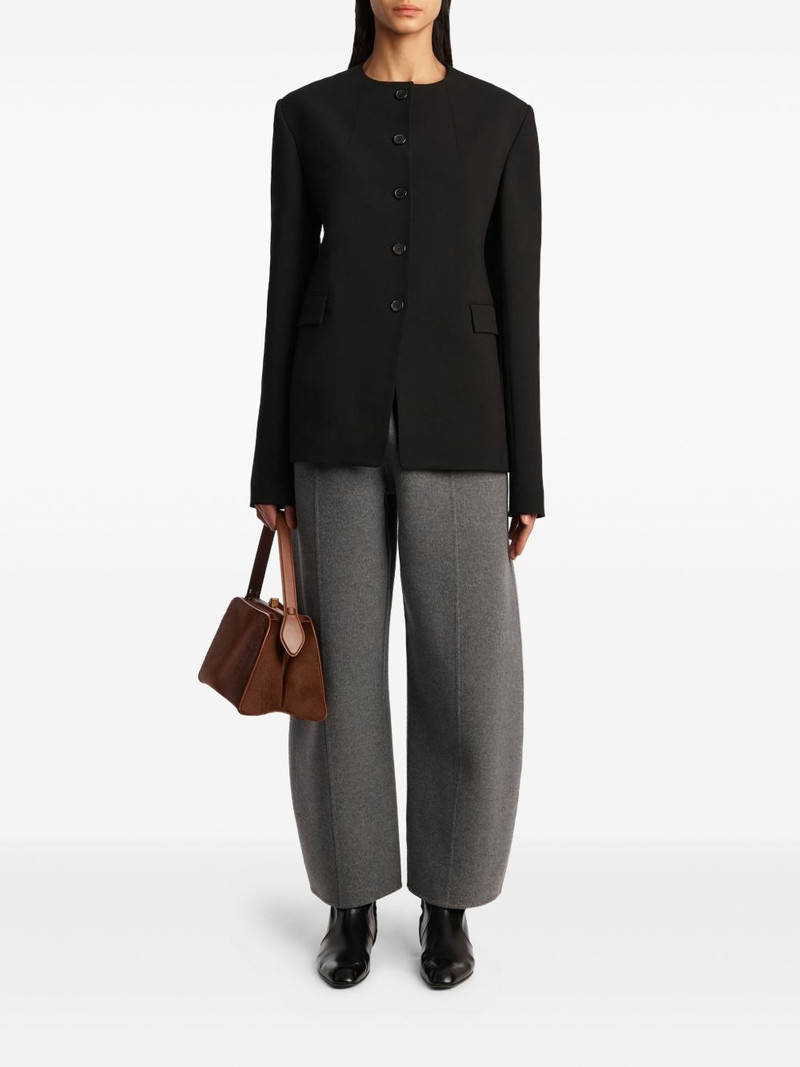 KHAITE elastic-waist panelled trousers outlook