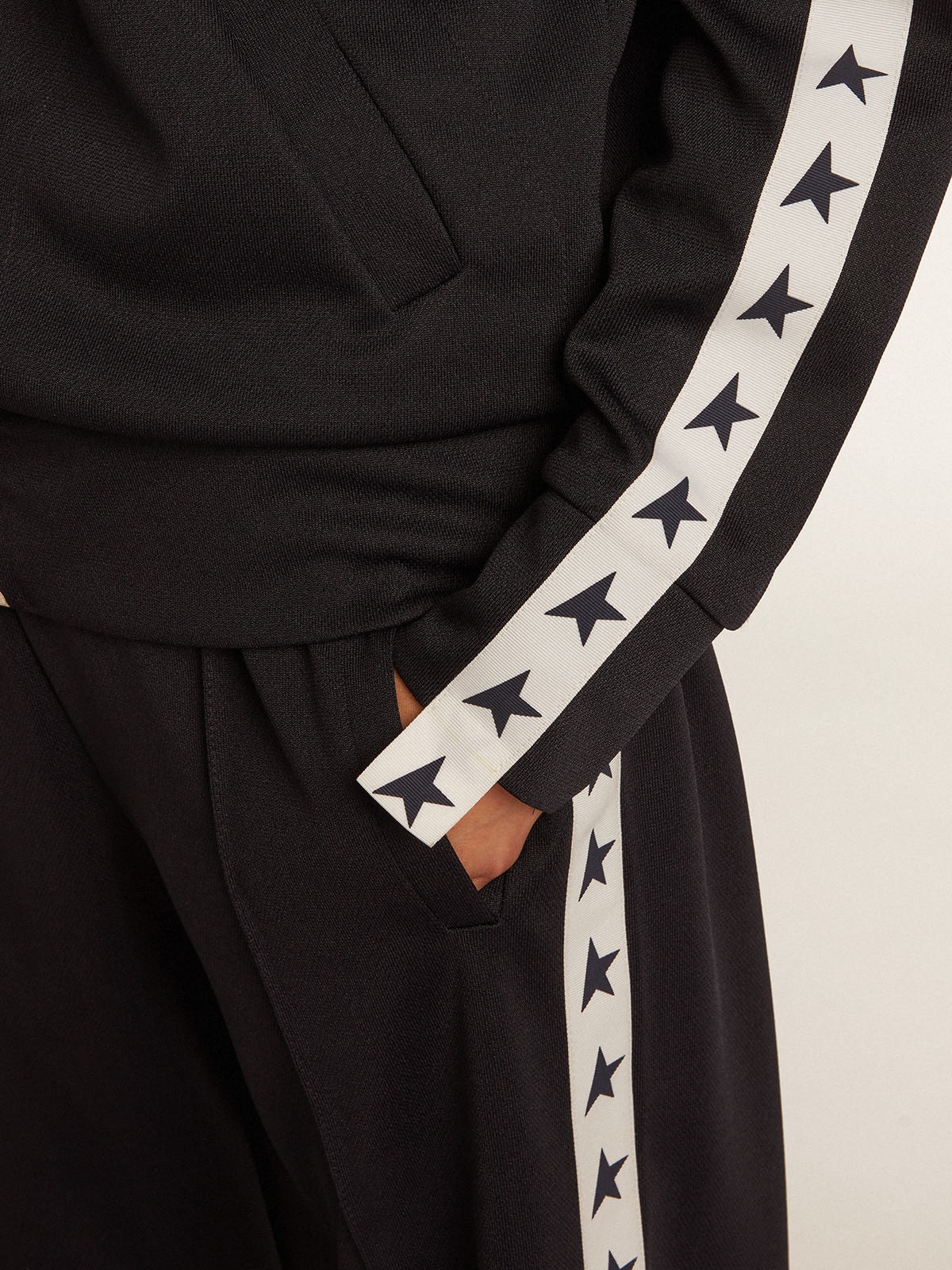 Dark blue joggers with white strip and contrasting stars - 5