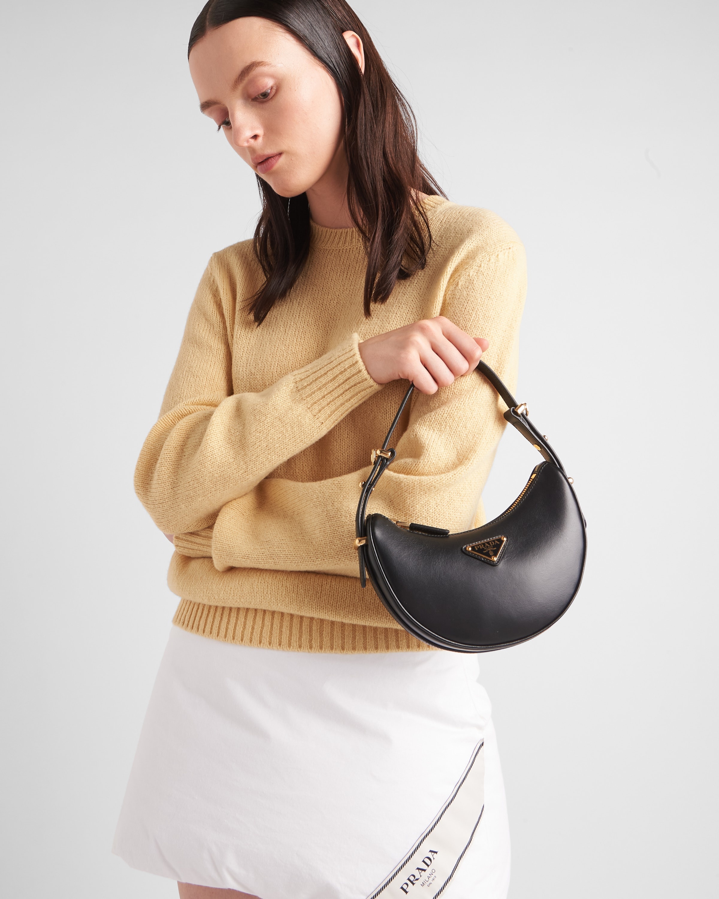 Prada Prada Arqué leather mini shoulder bag | REVERSIBLE