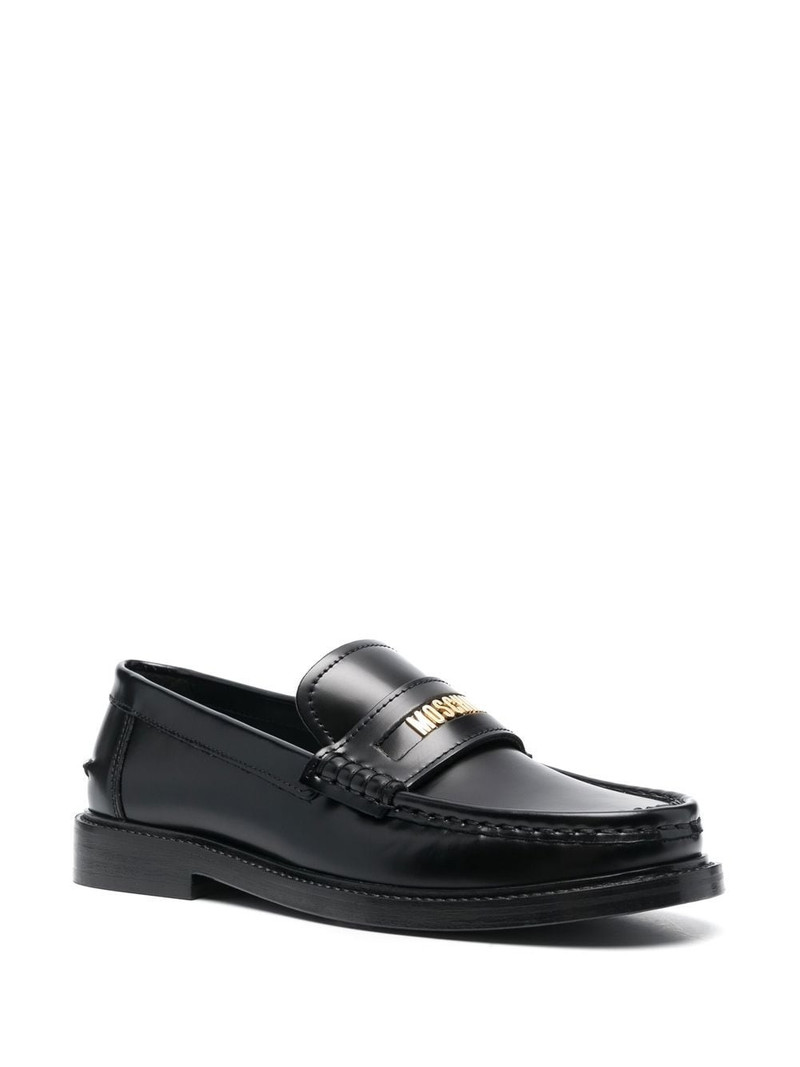 Moschino logo-plaque detail loafers outlook