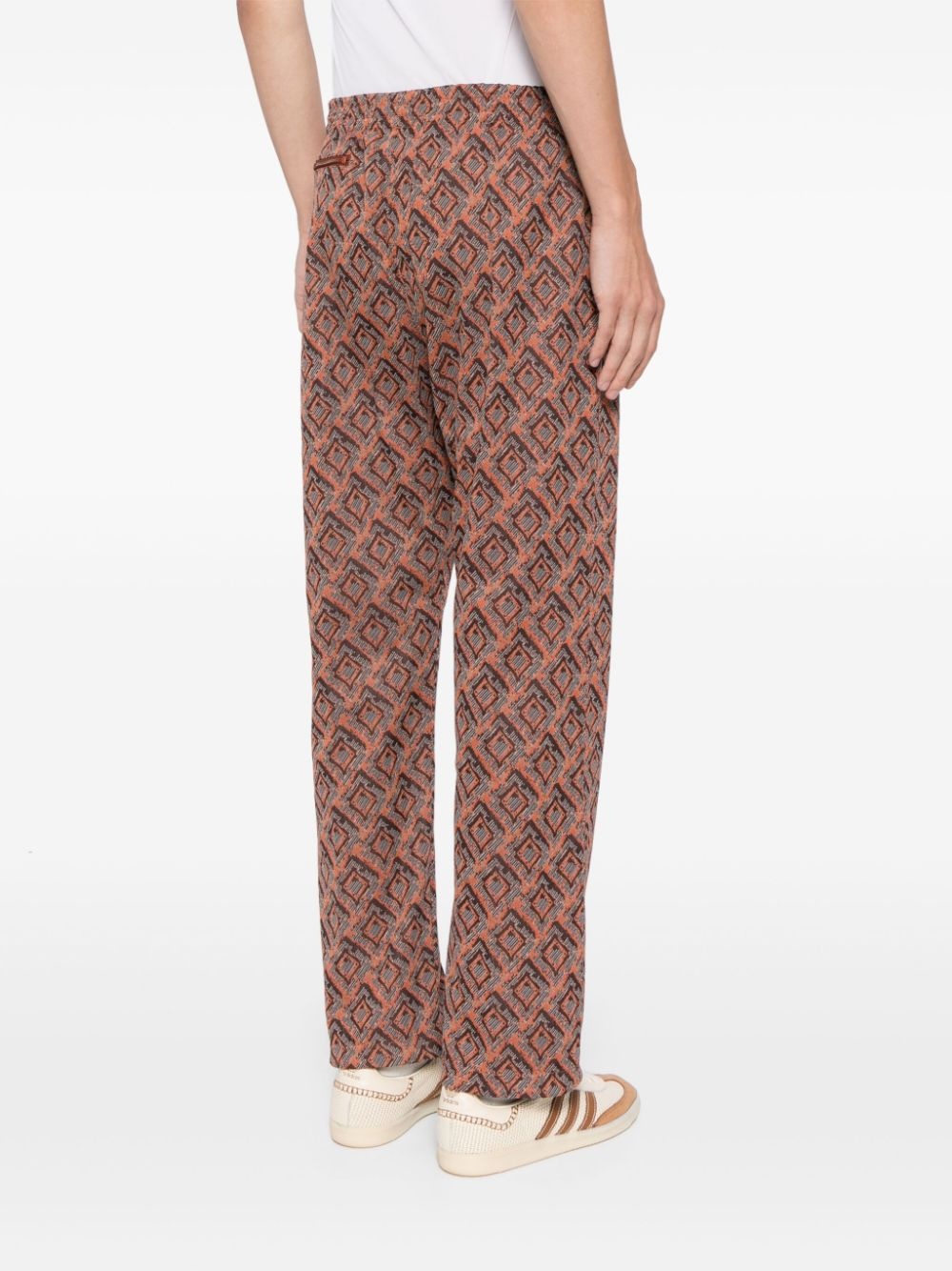 logo-embroidered patterned track pants - 4