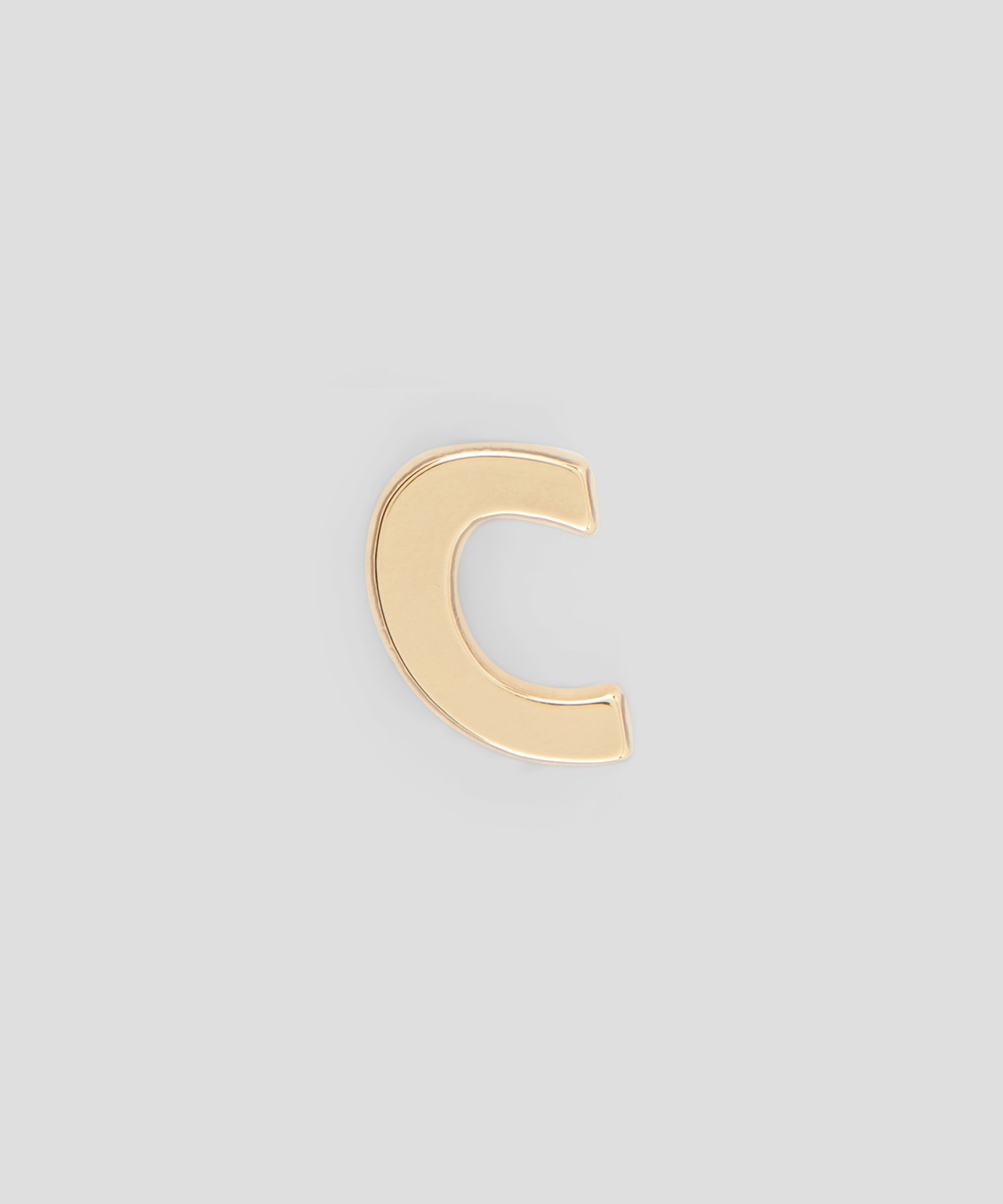 Single brass C charm - 1