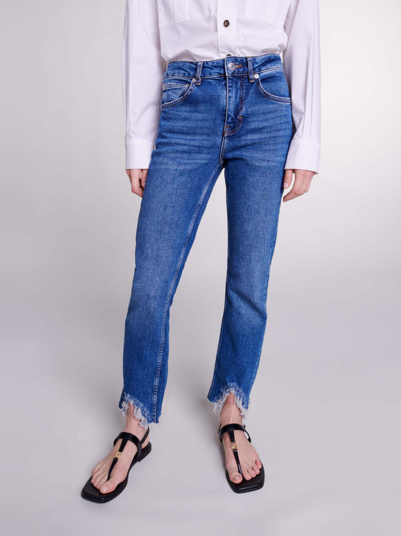 Slim-fit jeans, ripped at the bottom 3