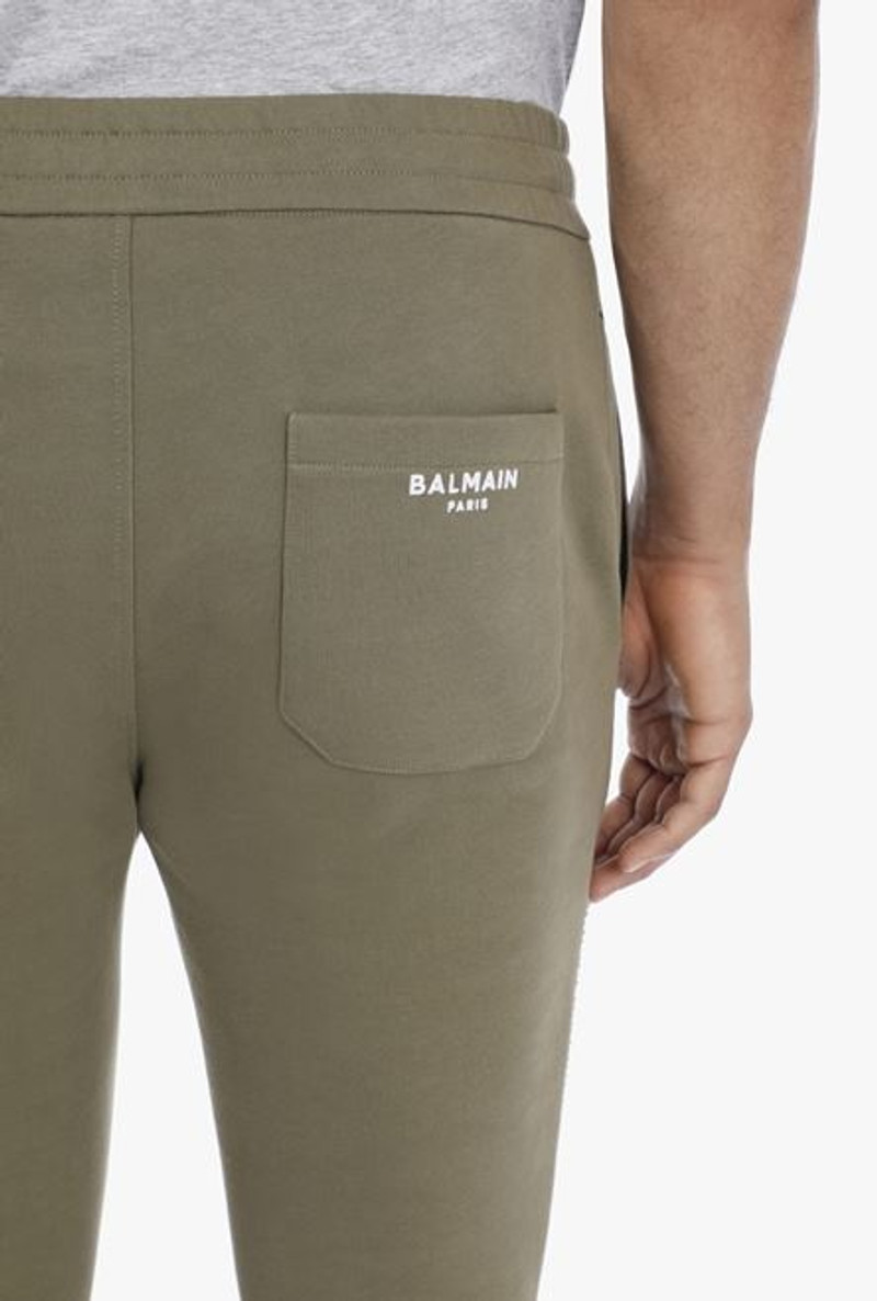 Olive green sustainable cotton sweatpants with white Balmain Paris logo 5