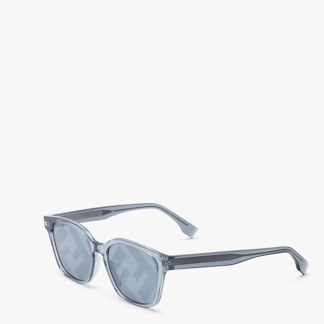 Square frames in transparent blue acetate with exclusive metal Pequin rivets on the front. Temples w - 2