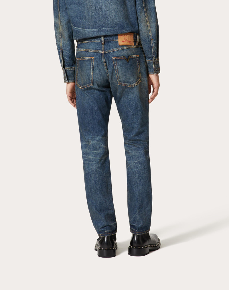 DENIM PANTS WITH METALLIC V DETAIL 4