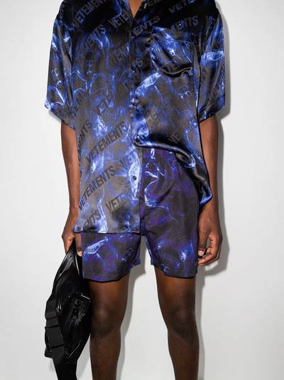 VETEMENTS Fluid Skulls swim shorts outlook