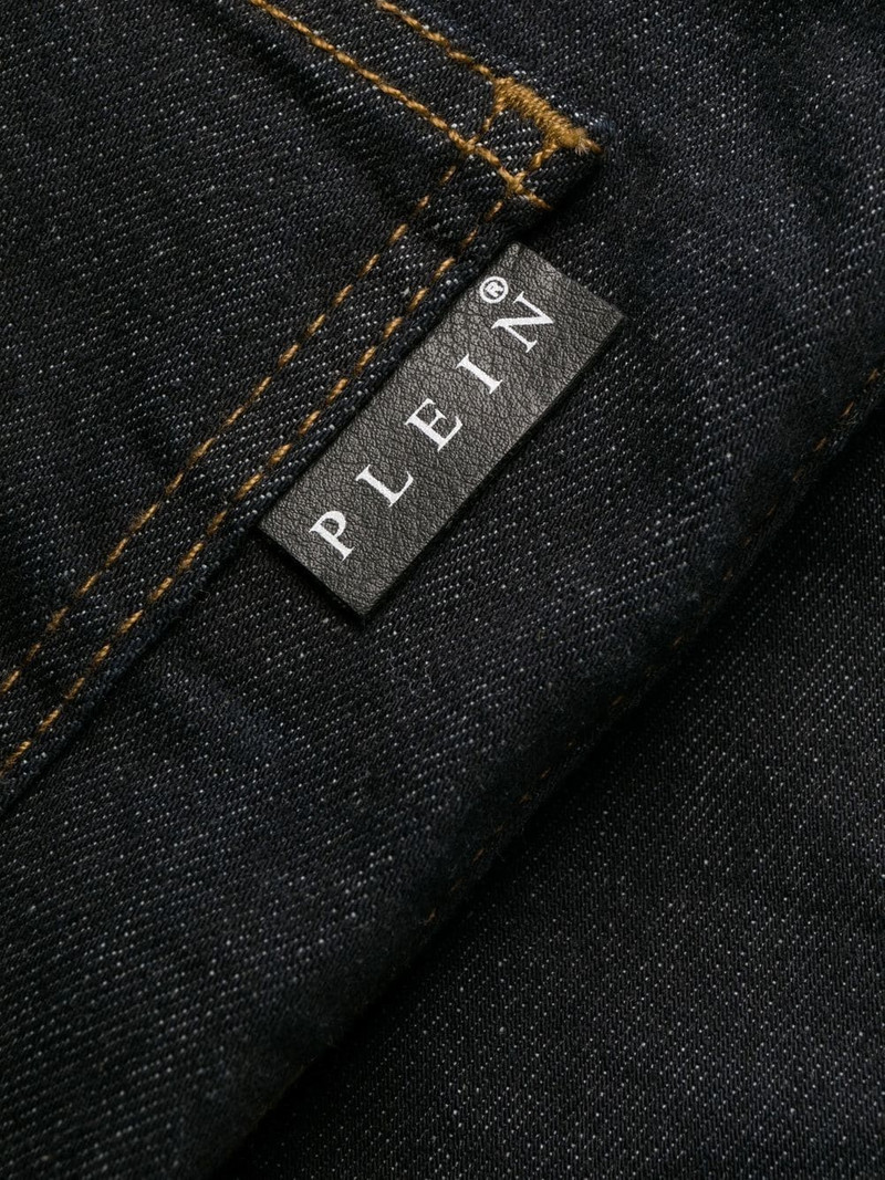 skull embroidered logo skinny jeans 7