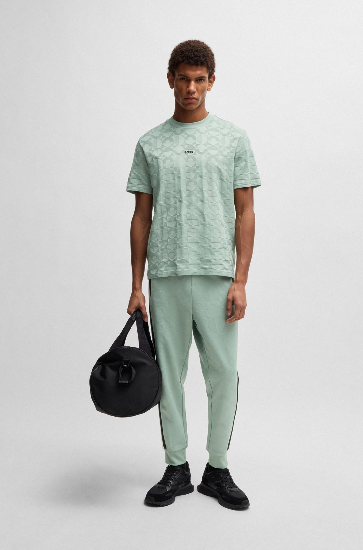 RELAXED-FIT TRACKSUIT BOTTOMS WITH JACQUARD-WOVEN CIRCLES - 4