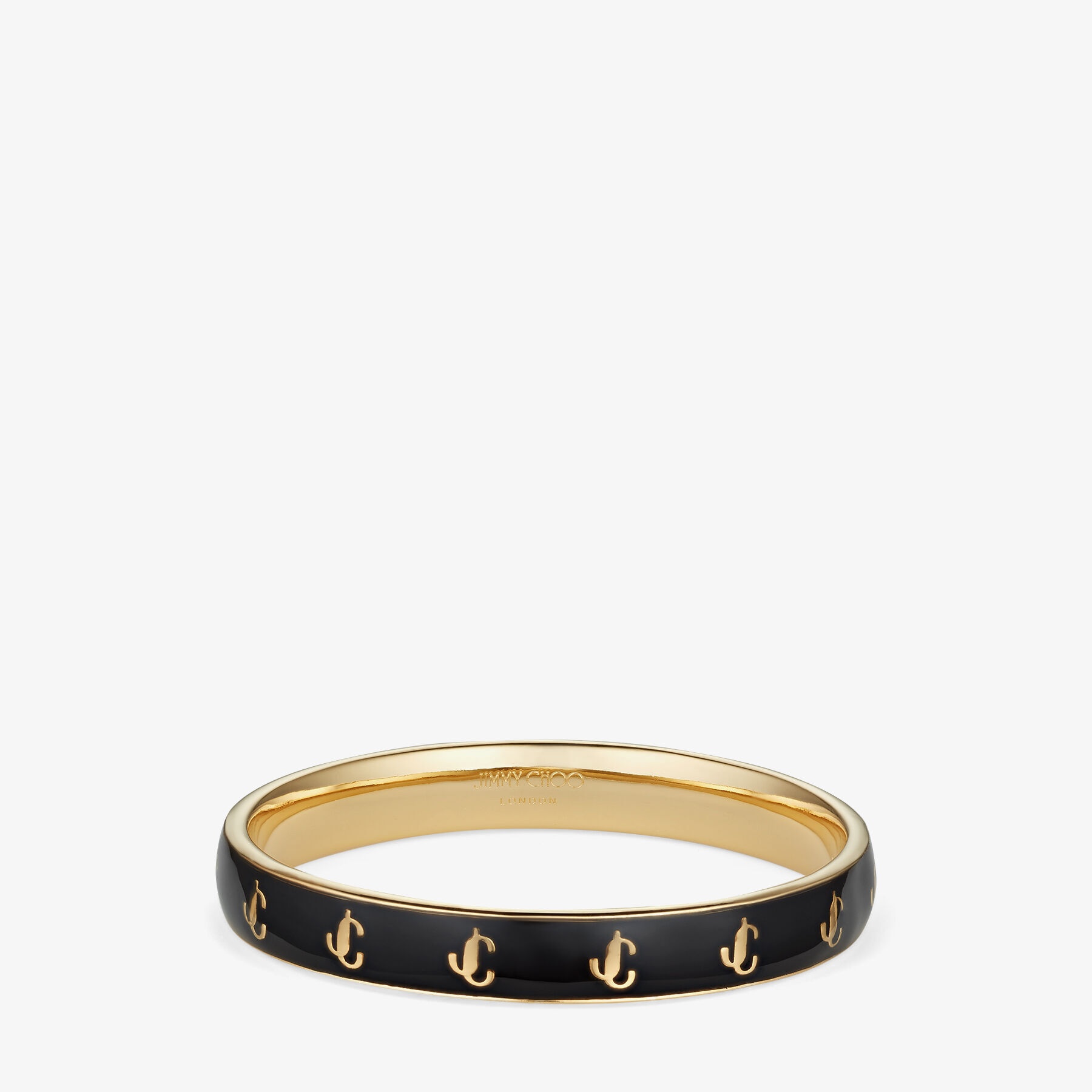JC Enamel Bangle
Gold-Finish Metal and Black Enamel JC Bangle - 1