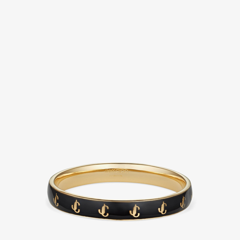 JC Enamel Bangle
Gold-Finish Metal and Black Enamel JC Bangle 1