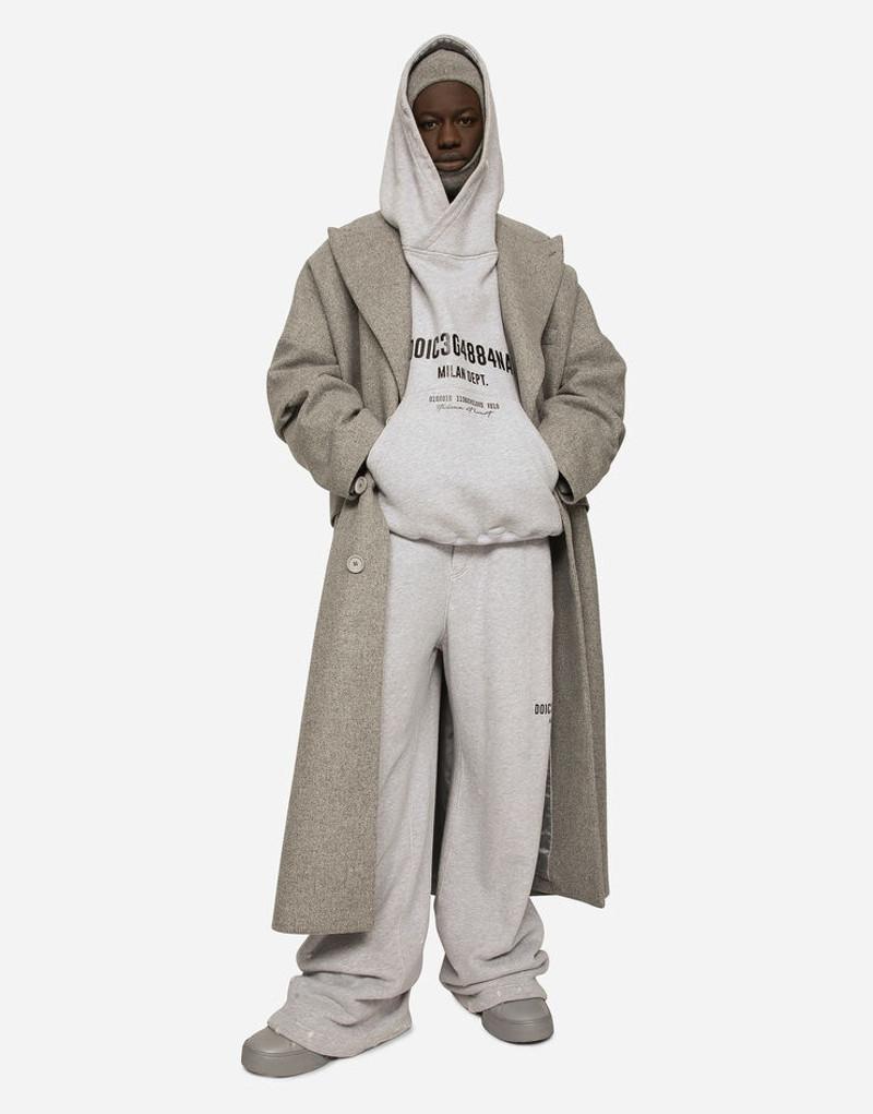Printed jogging pants with small abrasions 6