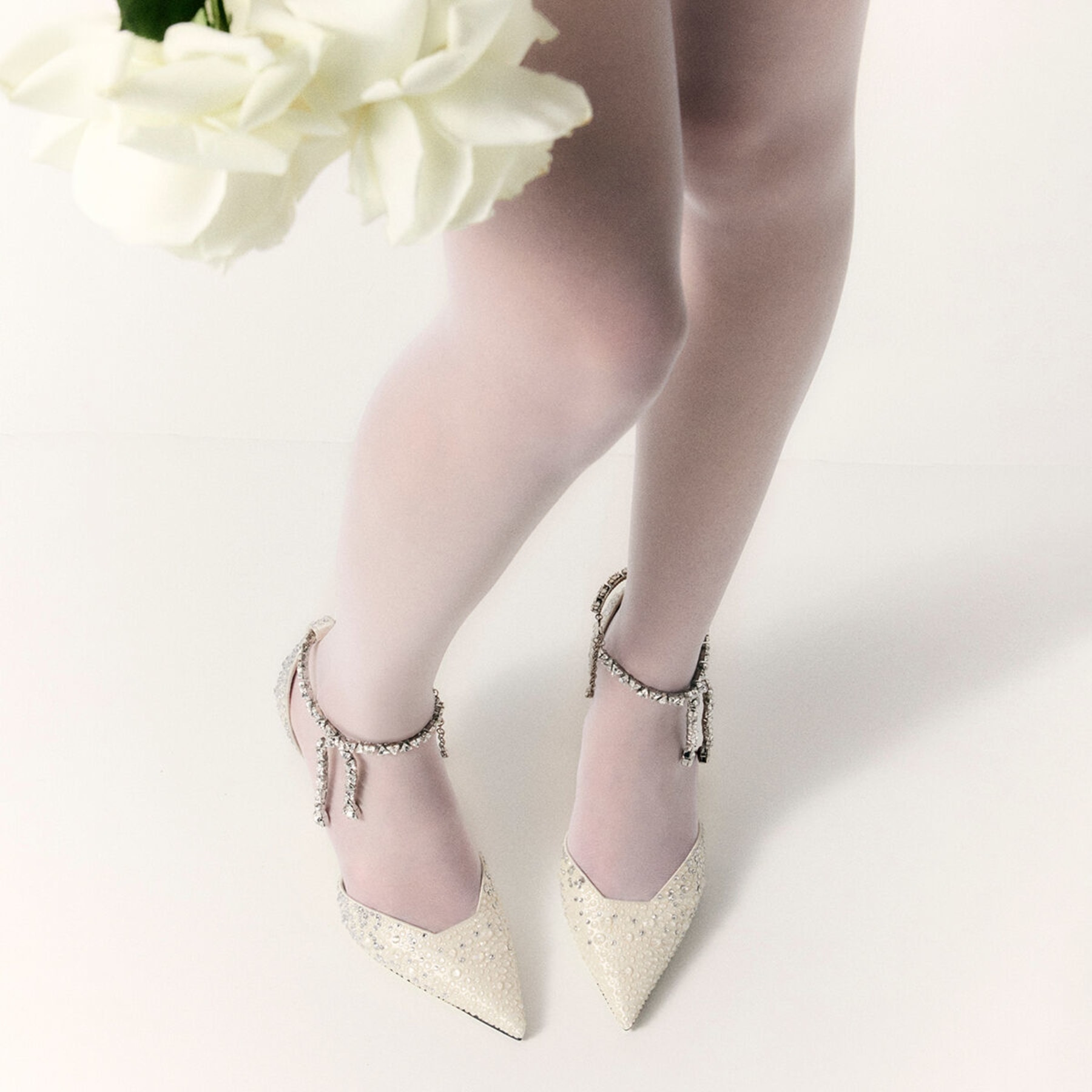 Stevie 100
Ivory Satin Crystal Pumps - 7