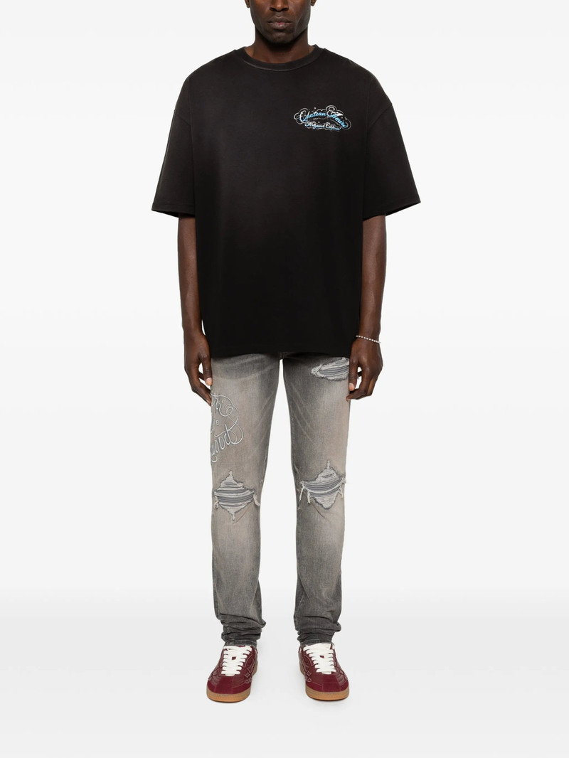 Amiri Ripped Embroidery Jeans 3