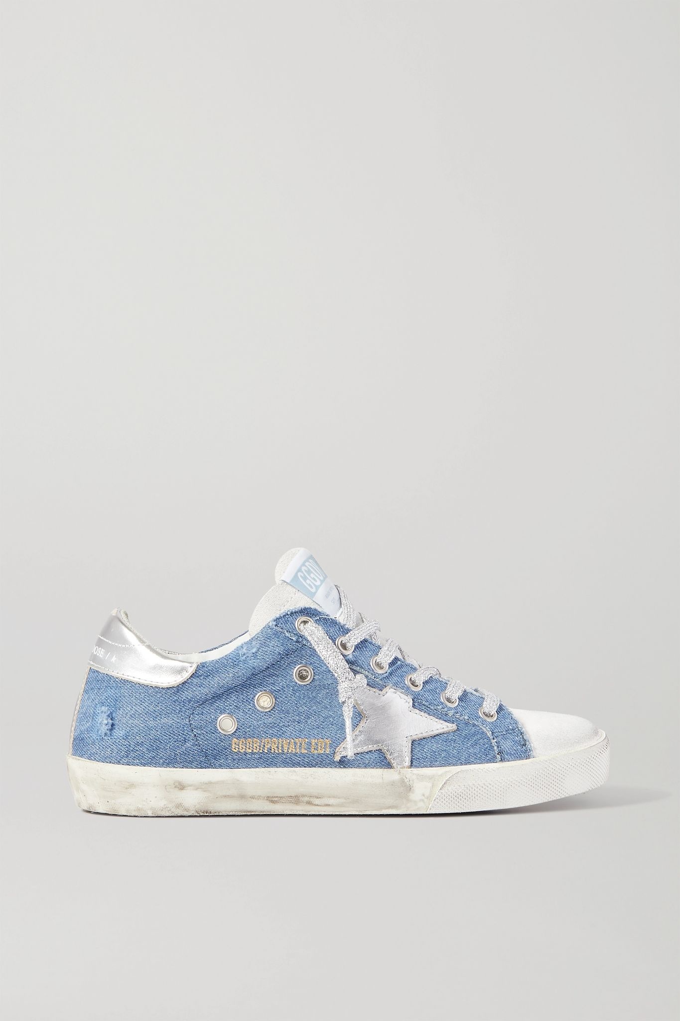 Superstar distressed denim and leather sneakers - 1