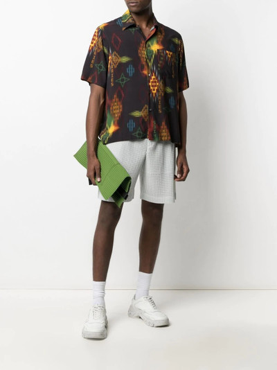 ISSEY MIYAKE perforated pleated shorts outlook